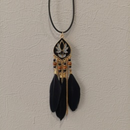 Амулет с перьями